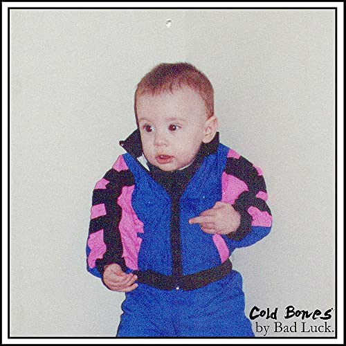 Album cover: a young child in a bright blue and pink ski suit.