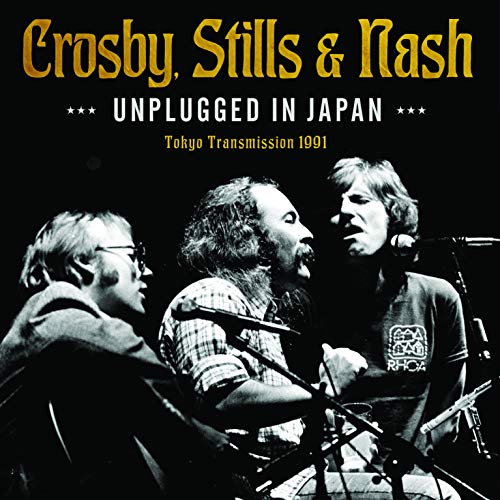 CD cover of Crosby, Stills & Nash performing live with instruments.