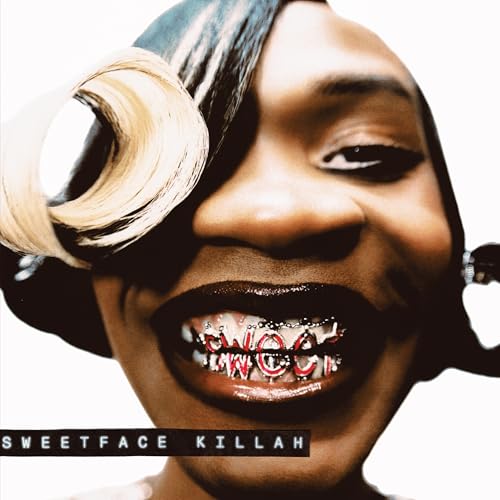 Close-up portrait of Sweetface Killah with grillz and blonde hair.
