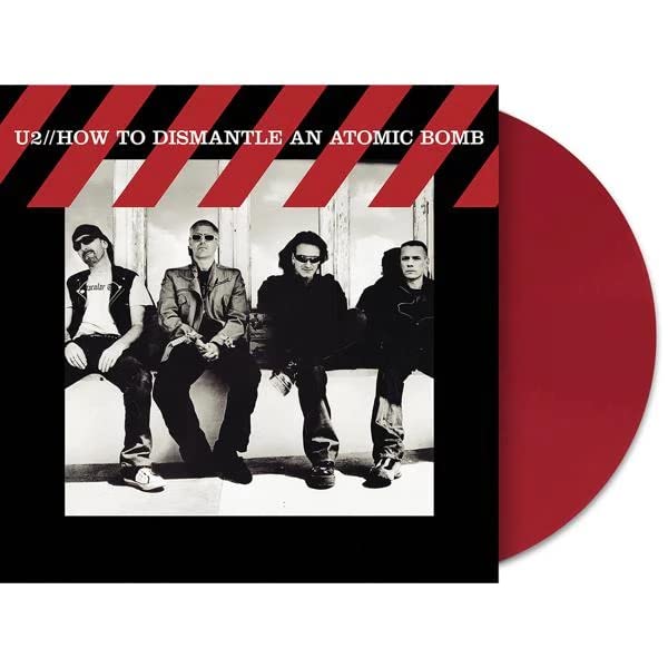 U2 album cover, “How to Dismantle an Atomic Bomb,” with red vinyl record.