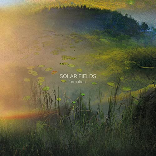 CD cover: pond with lily pads, reeds, and distant trees.
