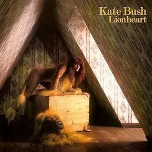 Kate Bush’s “Lionheart” album cover: a woman reclines in an attic space.