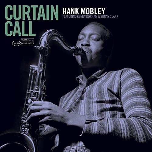 Hank Mobley album cover: a saxophonist playing, dark blue background.