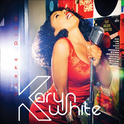Karyn White in a red dress singing into a vintage microphone on album cover.