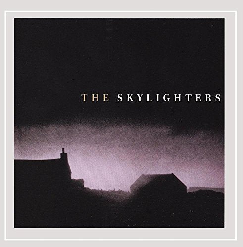 CD cover for The Skylighters, showing silhouetted buildings under a dark sky.