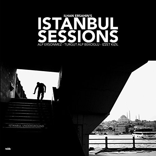 Black and white album cover showing a silhouette on stairs overlooking an Istanbul cityscape.