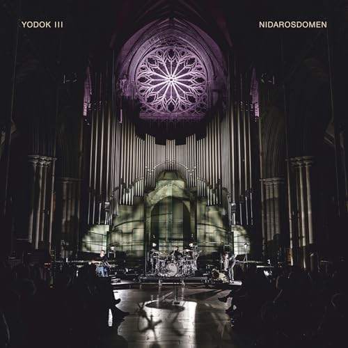 CD cover: interior of Nidaros Cathedral with a band performing.
