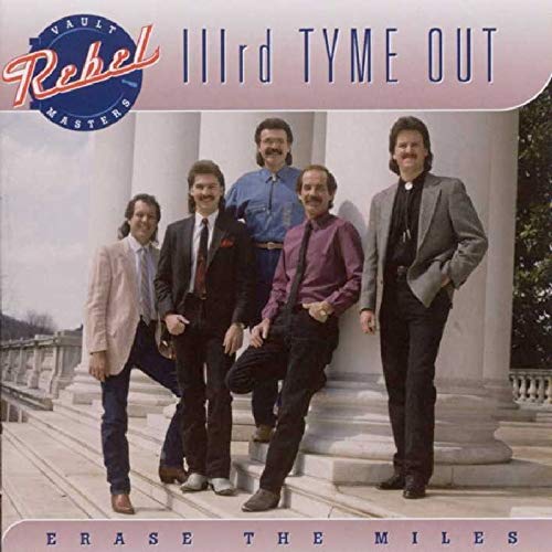CD cover for Iiird Tyme Out featuring four men in suits.