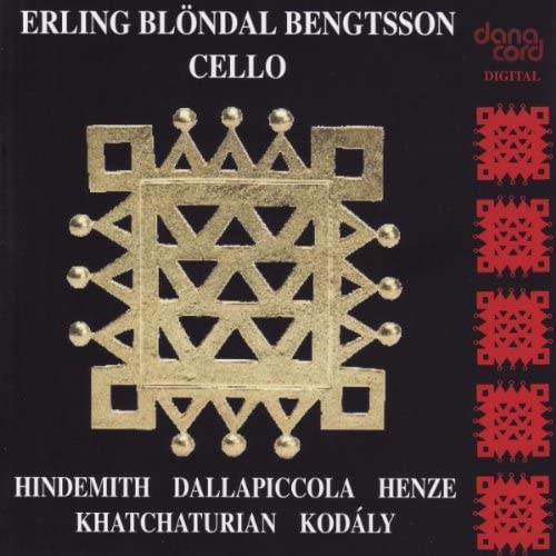 CD cover: gold geometric design on black, with red geometric border.