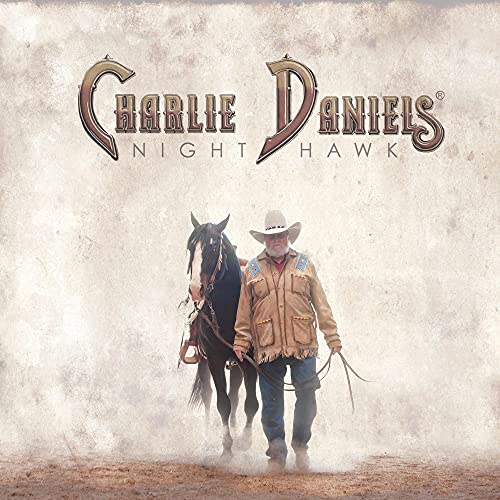 Charlie Daniels with a black horse, album cover for "Night Hawk".