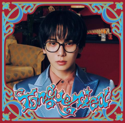 CD cover featuring a young man with dark hair and glasses, ornate blue frame.