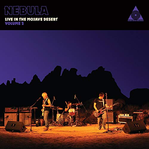 Band Nebula performing live in the Mojave Desert at dusk.