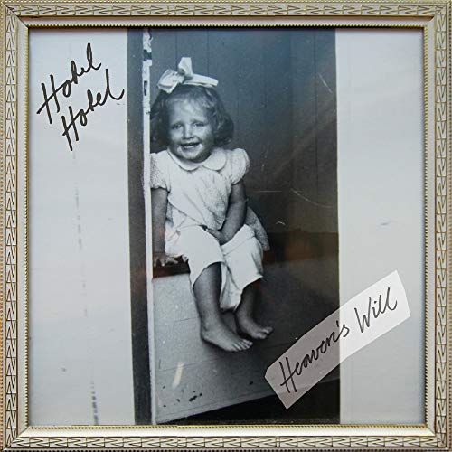 Black and white photo of a smiling young child, CD cover art.