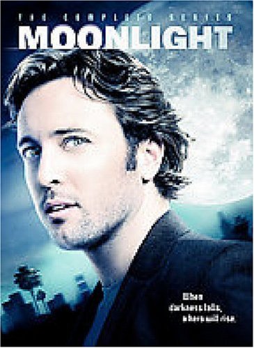DVD cover featuring a man's portrait against a large moon and city silhouette.