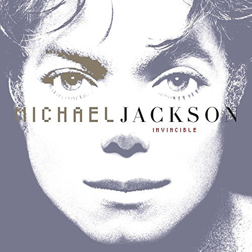 Close-up portrait of Michael Jackson on the Invincible album cover in shades of grey.