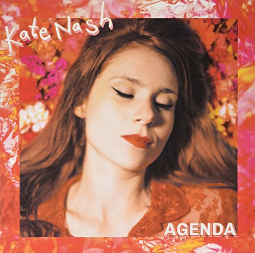 Kate Nash “Agenda” EP vinyl cover with portrait and floral background.