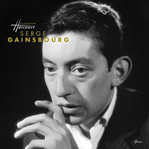 Black and white portrait of Serge Gainsbourg with hand to chin.