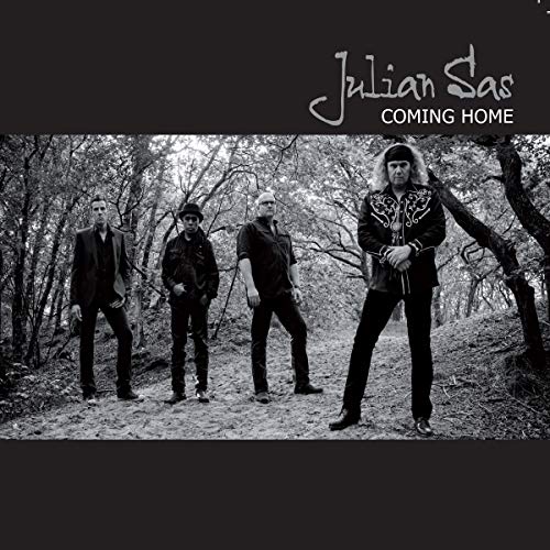 Black and white album cover featuring four men in a wooded area.