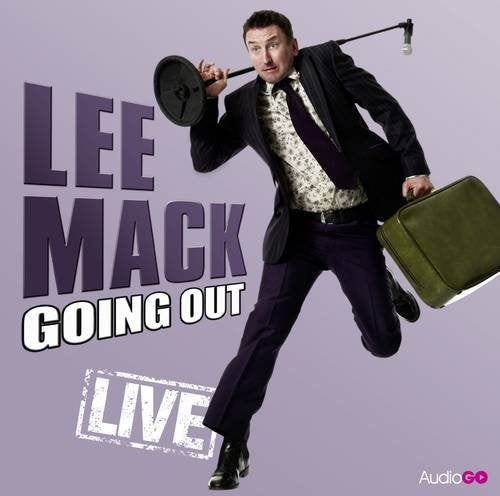 Lee Mack in suit, holding a frying pan and carrying a briefcase.