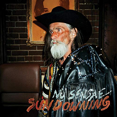 CD cover featuring a man in a cowboy hat and leather jacket.