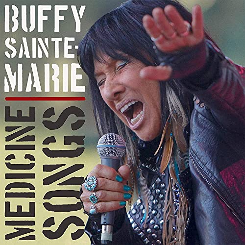 Buffy Sainte-Marie singing into a microphone, album cover art.