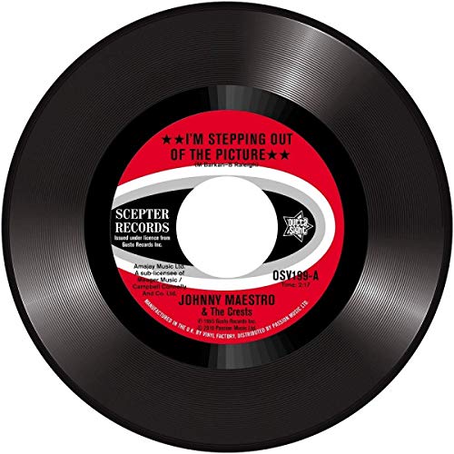 Black vinyl record with a red and white label featuring text and logos.