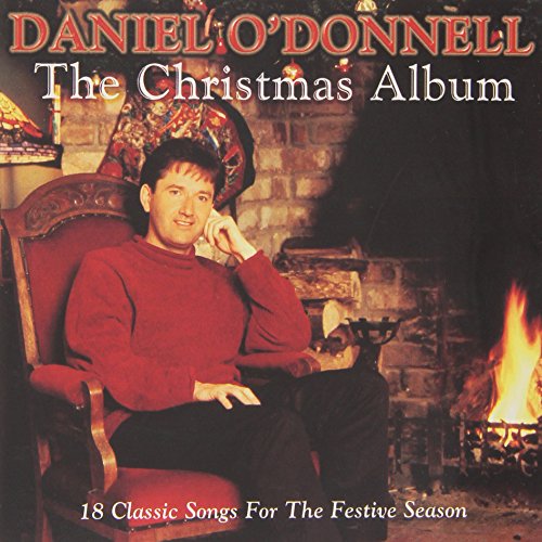 Album cover featuring Daniel O'Donnell seated by a warm fireplace.