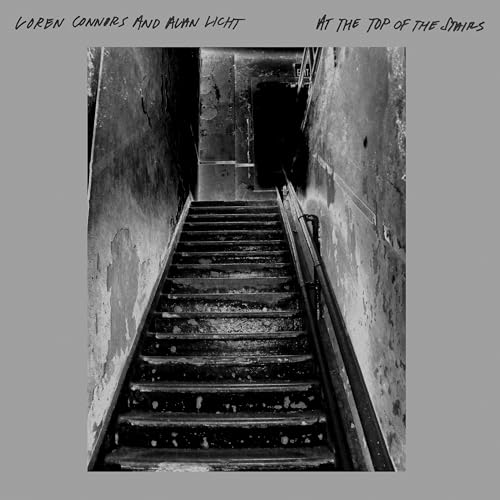 Black and white album cover showing a dimly lit staircase.
