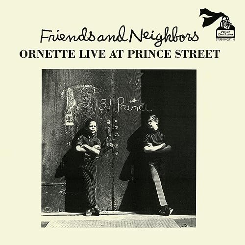 Album cover: two people stand before a graffitied door, "131 Prince".