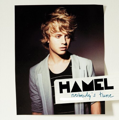 CD cover featuring a young man with curly hair in a grey sweater.