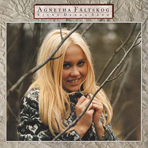 Agnetha Fältskog album cover, portrait of a blonde woman with branches.