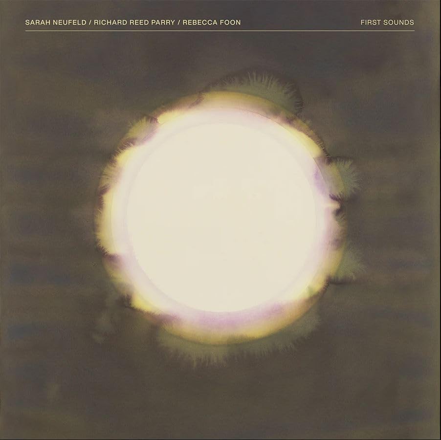 CD cover: abstract glowing orb on a dark, textured background.