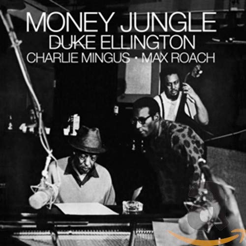 Black and white photo of Duke Ellington, Charles Mingus, and Max Roach in studio.