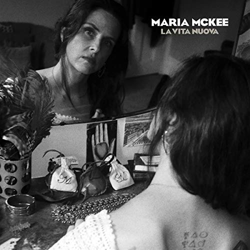 Black and white album cover featuring Maria McKee looking at her reflection.