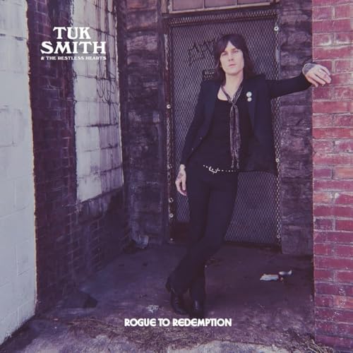 Album cover featuring Tuk Smith leaning against a brick wall.