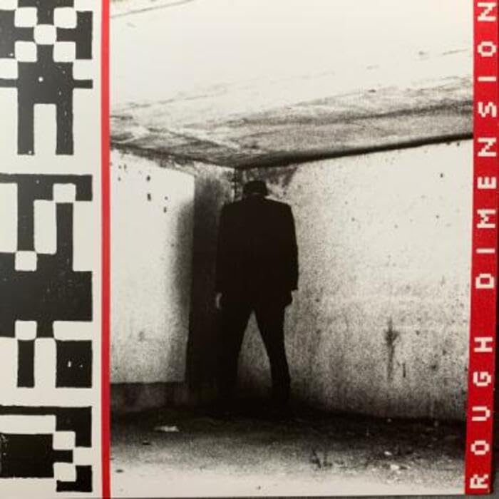 Black and white album cover featuring a silhouetted figure in a doorway.