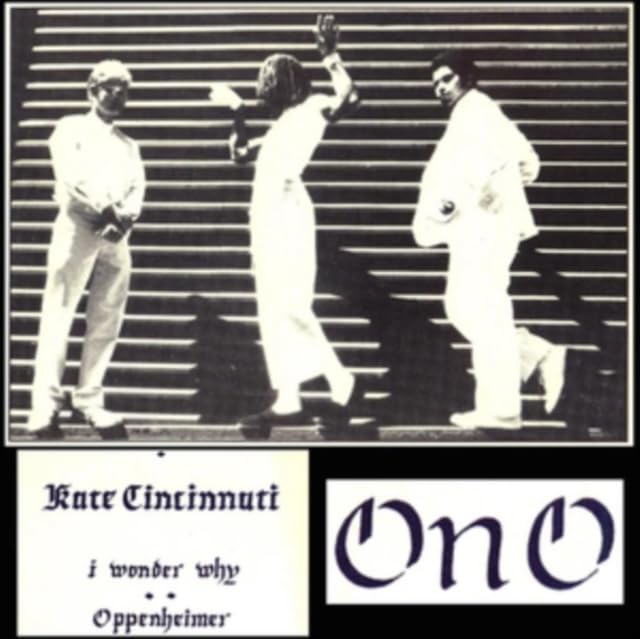 Black and white album cover with three figures in motion and text.