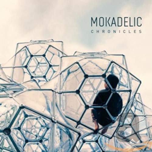 CD cover for Mokadelic’s “Chronicles” featuring a person within geometric structures.