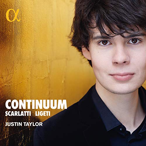 CD cover featuring a young man with dark hair, gold background.