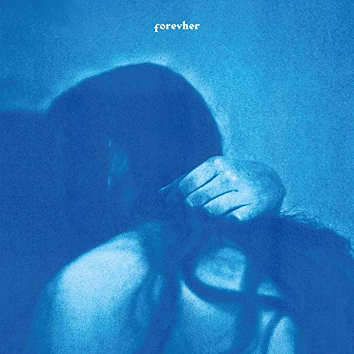 Blue-toned album cover featuring a person obscured by shadows and hands.