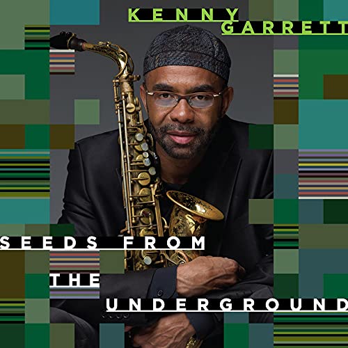 Kenny Garrett album cover featuring the artist with a saxophone.