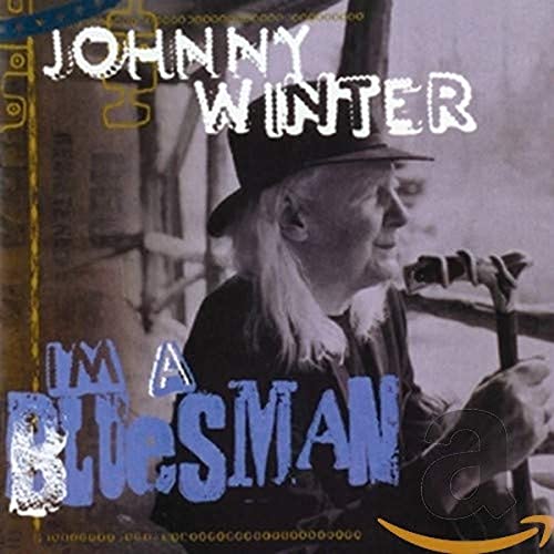Johnny Winter CD cover featuring a portrait of the musician with a guitar.