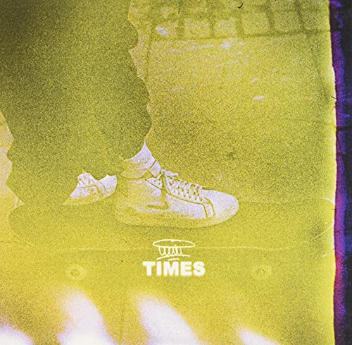Yellow album cover with sneakers and the word "TIMES" below.