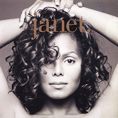 Janet Jackson album cover, close-up portrait with curly hair.