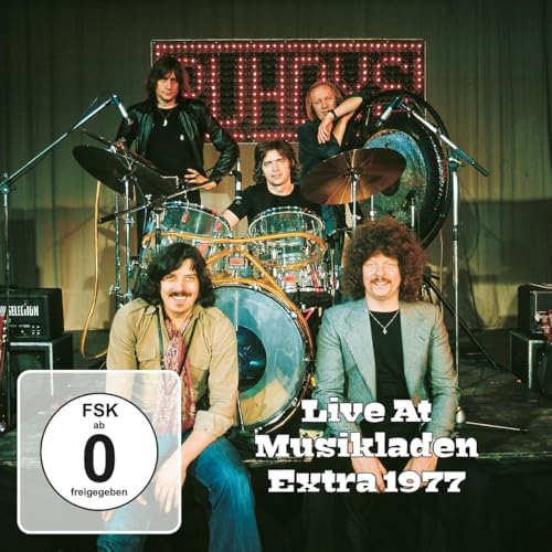 Puhdys band photo from 1977, with drums and a rating logo.