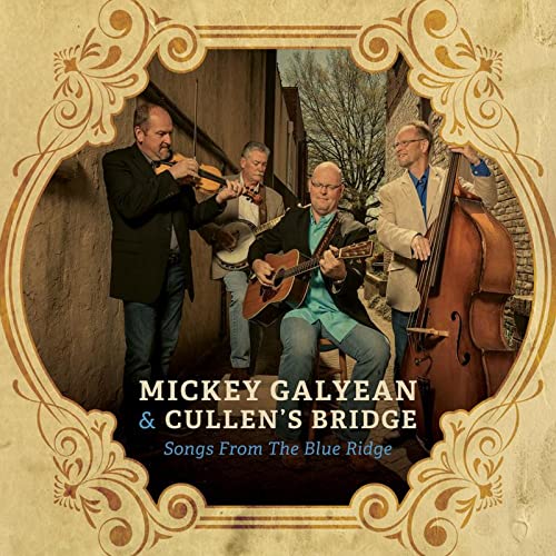 Four musicians with string instruments framed by an ornate gold border.
