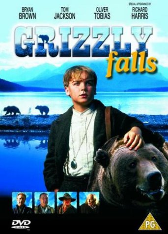 “Grizzly Falls” DVD cover featuring a boy with a bear and snowy mountains.