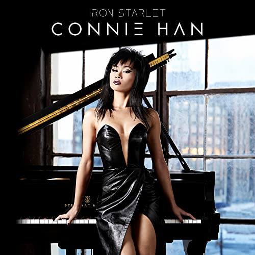 Connie Han album cover featuring a woman with a grand piano.