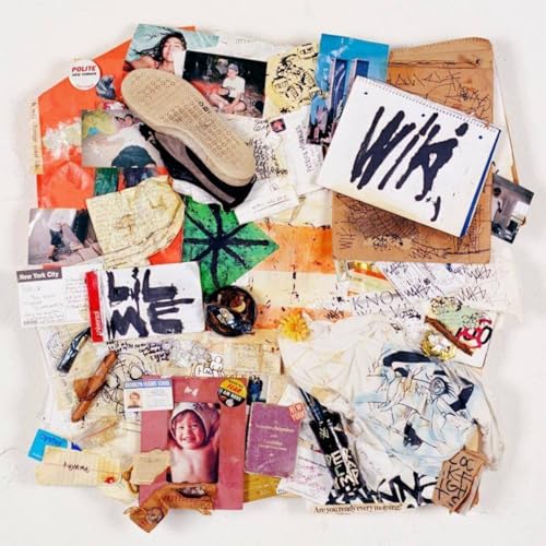Collage of photos, objects, and text arranged on a white surface.