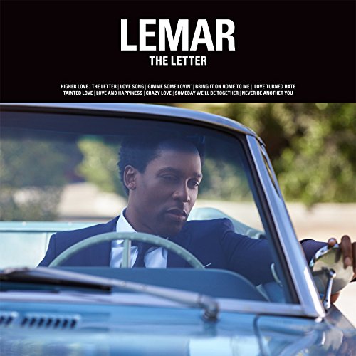 Lemar album cover: man driving a classic blue car, looking forward.